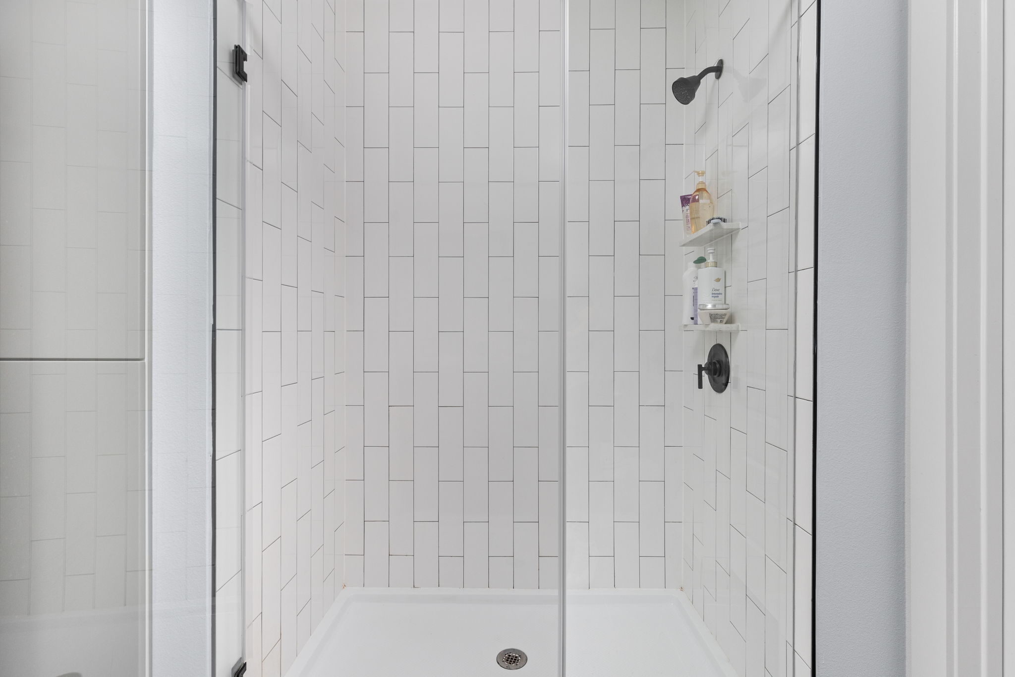 2500 Longview Street, Unit 405 Austin, TX 78705 - Photo 14 of 28 Full bathroom with a shower stall