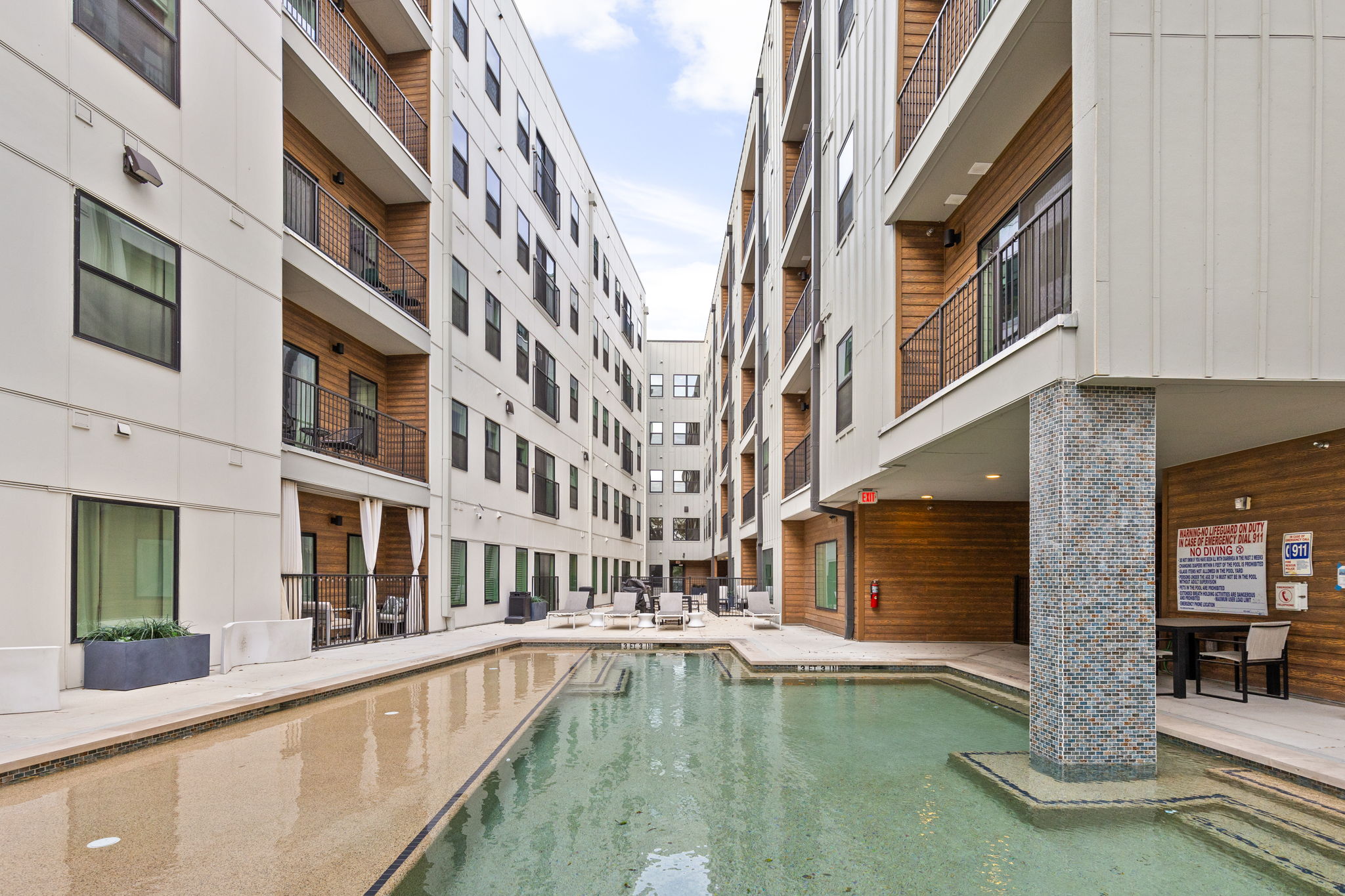 2500 Longview Street, Unit 405 Austin, TX 78705 - Photo 24 of 28 Community pool with a patio area