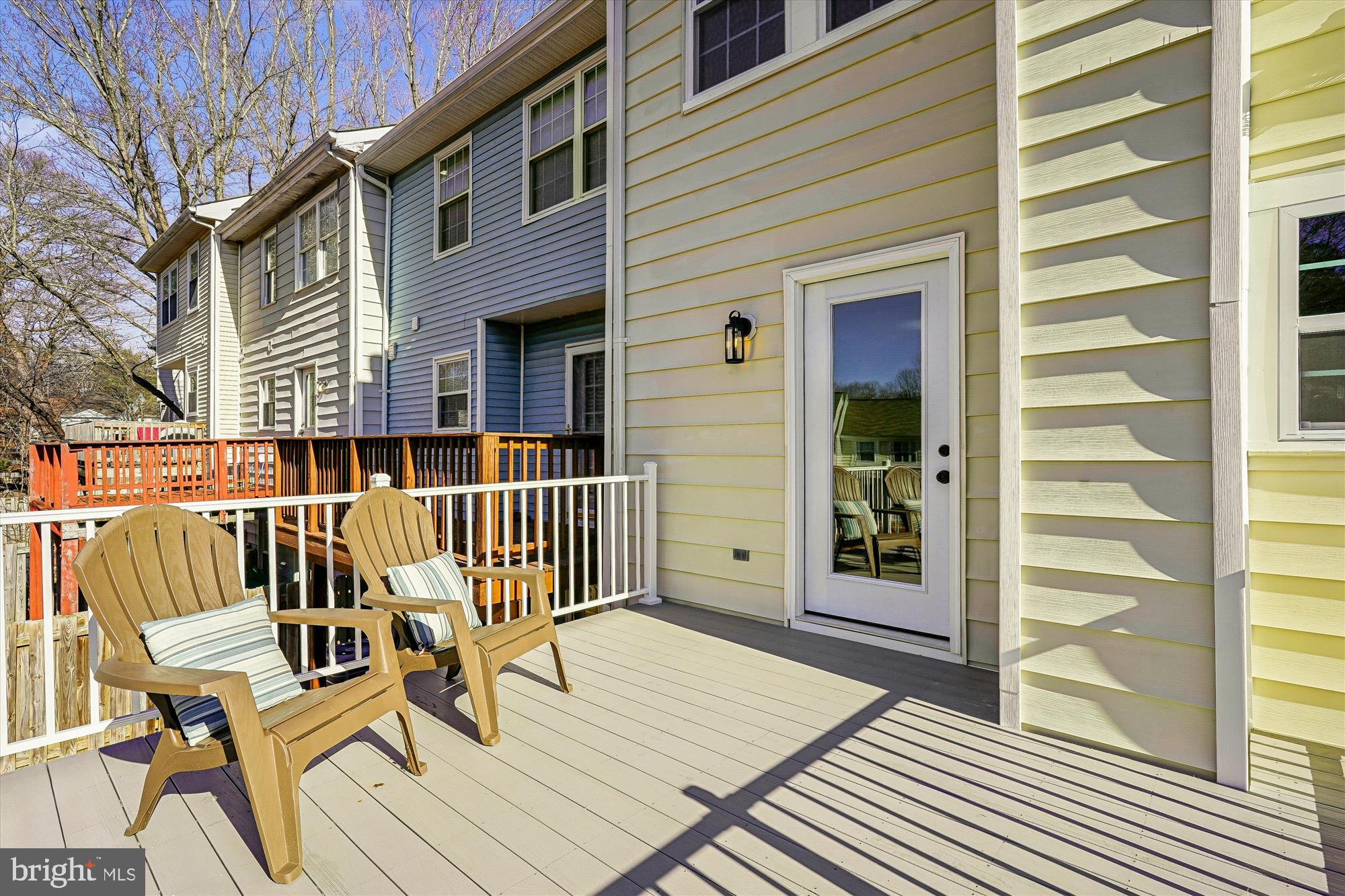 5146 Spring Branch Boulevard Dumfries, VA 22025 - Photo 12 of 38 a view of a patio with a table and chairs