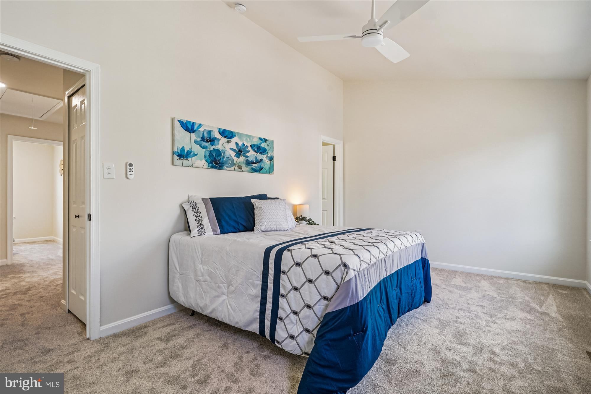 5146 Spring Branch Boulevard Dumfries, VA 22025 - Photo 17 of 38 a bedroom with a bed and a painting on the wall