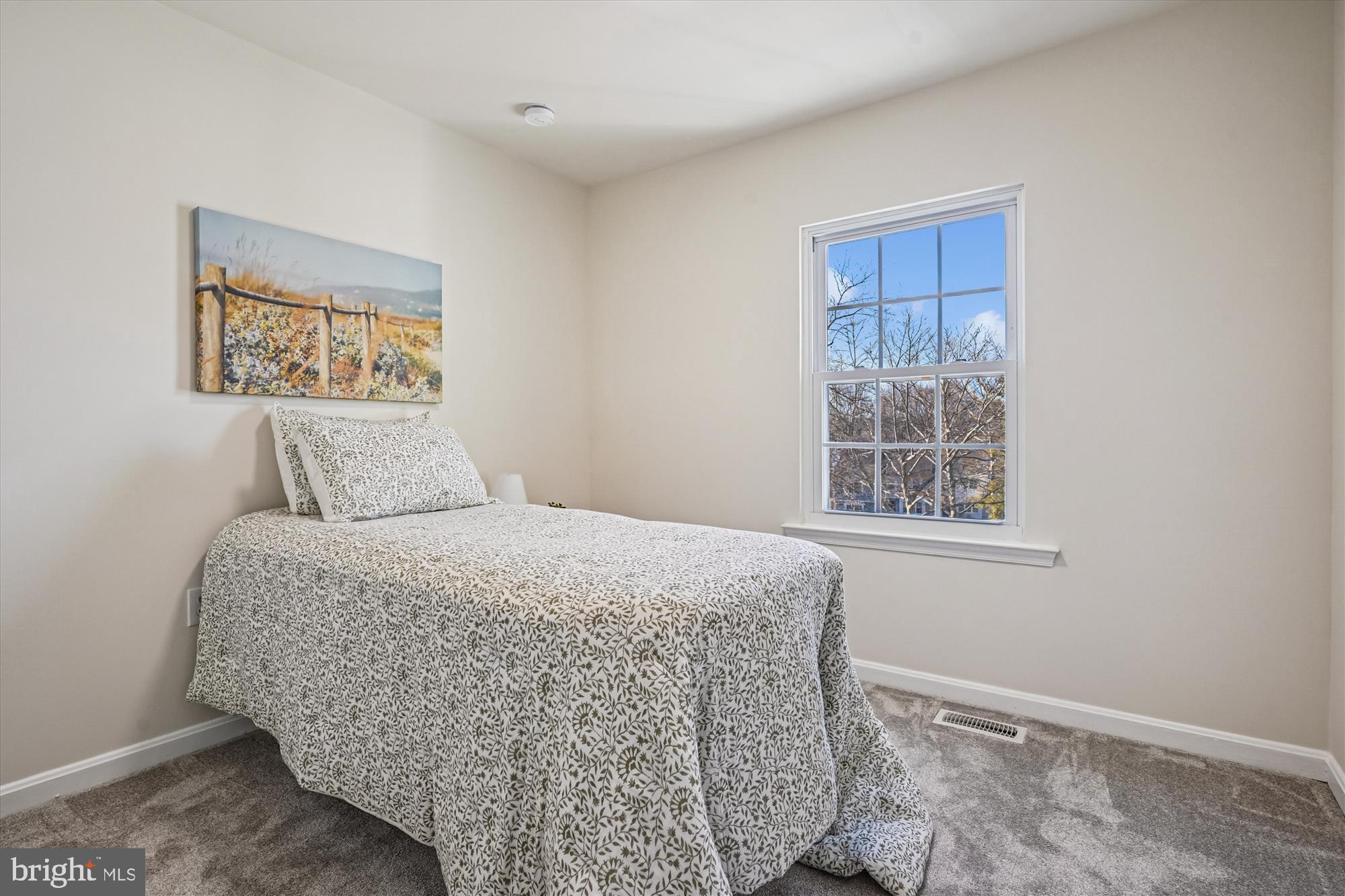 5146 Spring Branch Boulevard Dumfries, VA 22025 - Photo 19 of 38 a bedroom with bed and window