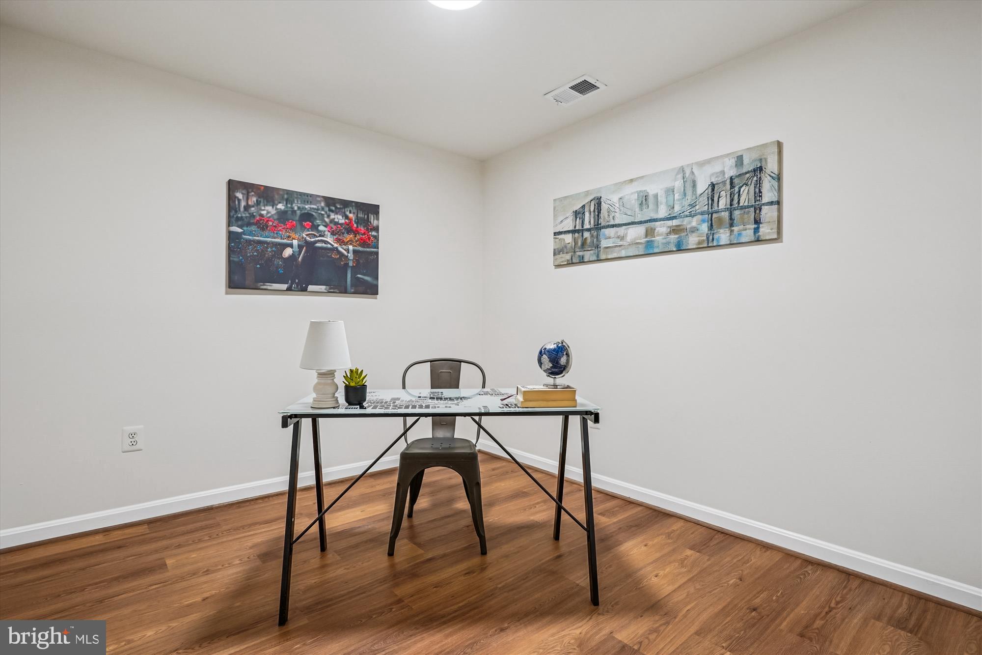 5146 Spring Branch Boulevard Dumfries, VA 22025 - Photo 26 of 38 a view of a workspace with furniture and wooden floor