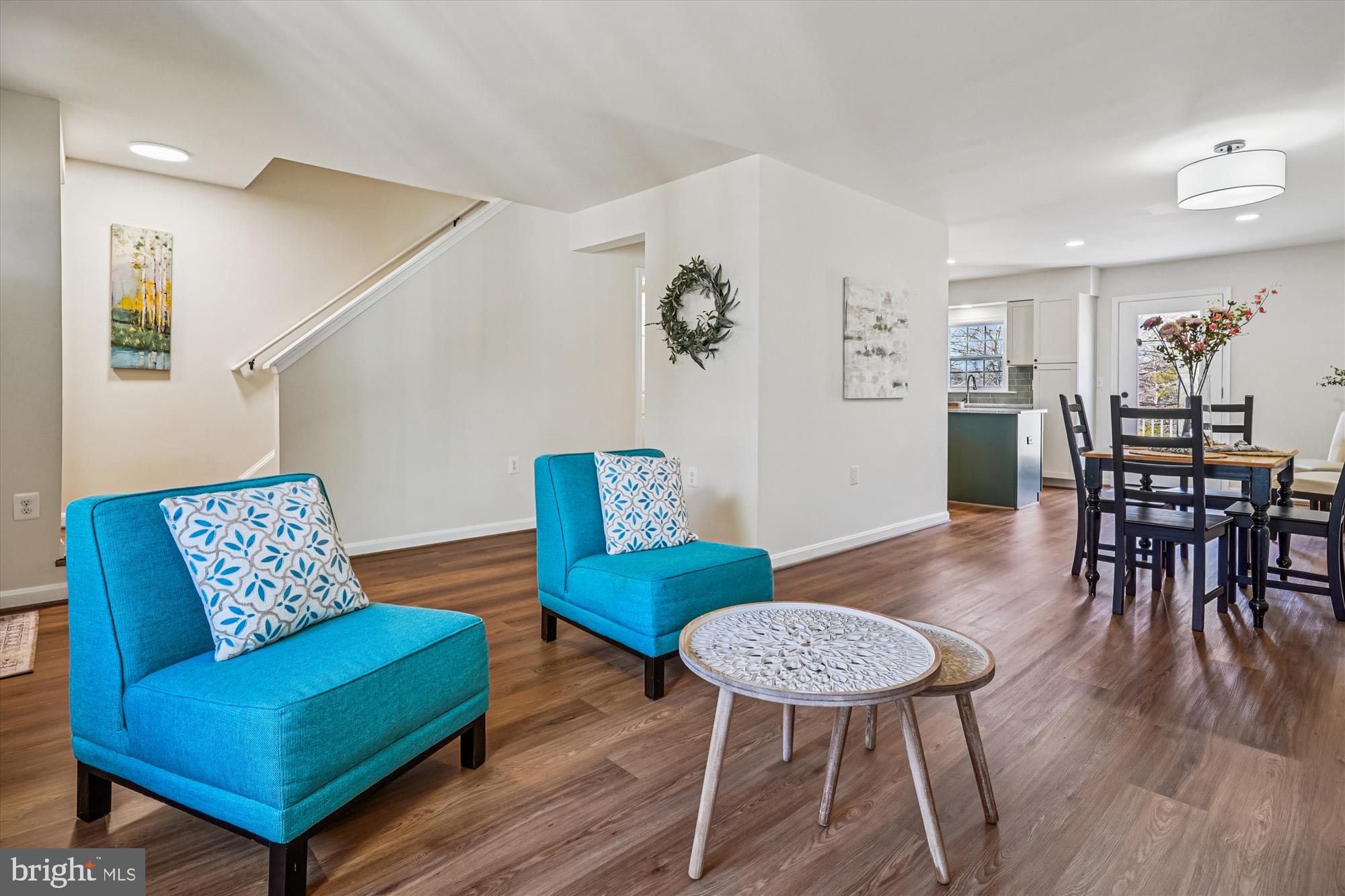 5146 Spring Branch Boulevard Dumfries, VA 22025 - Photo 6 of 38 a view of a dining room with furniture and wooden floor