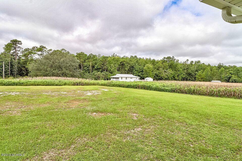 6668 Funston Road Southeast Winnabow, NC 28479 - Photo 19 of 22 looking from one house to the other