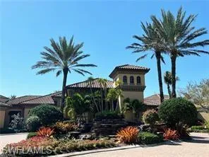a front view of house with a garden