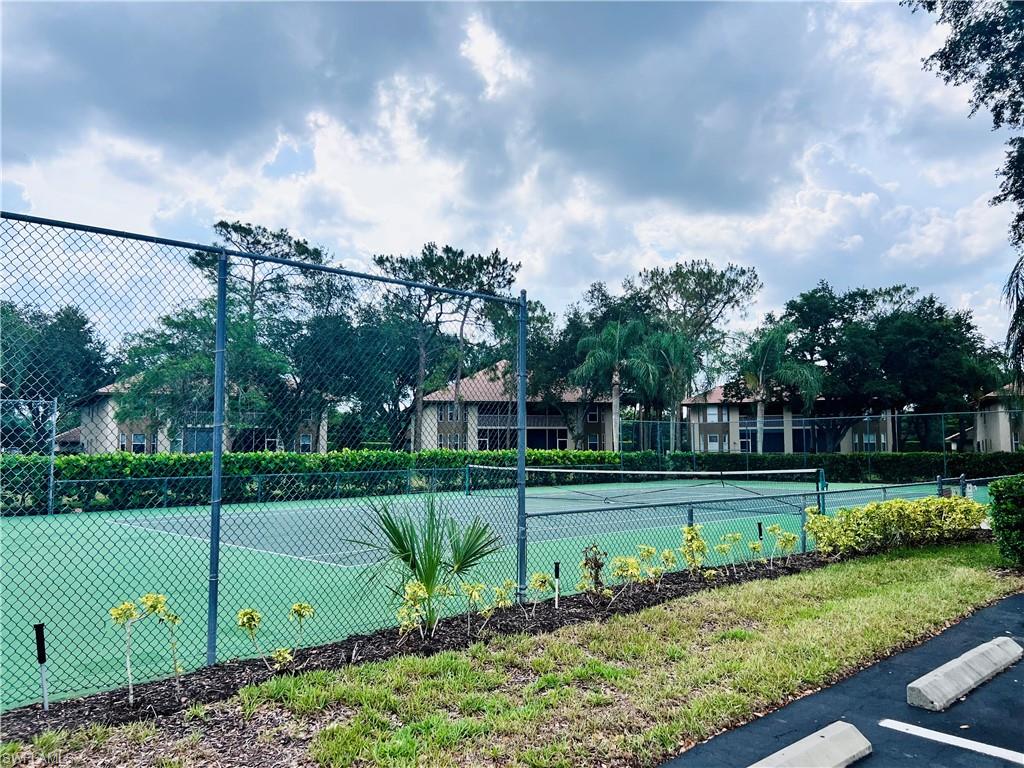 8073 Panther Trail, Unit 1404 Naples, FL 34113 - Photo 24 of 28 a view of a park