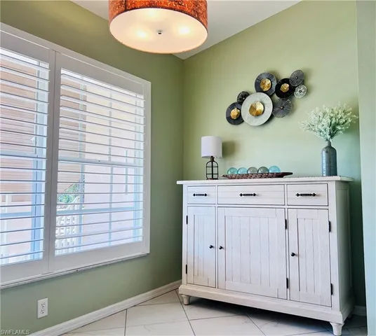 a room with cabinets and window