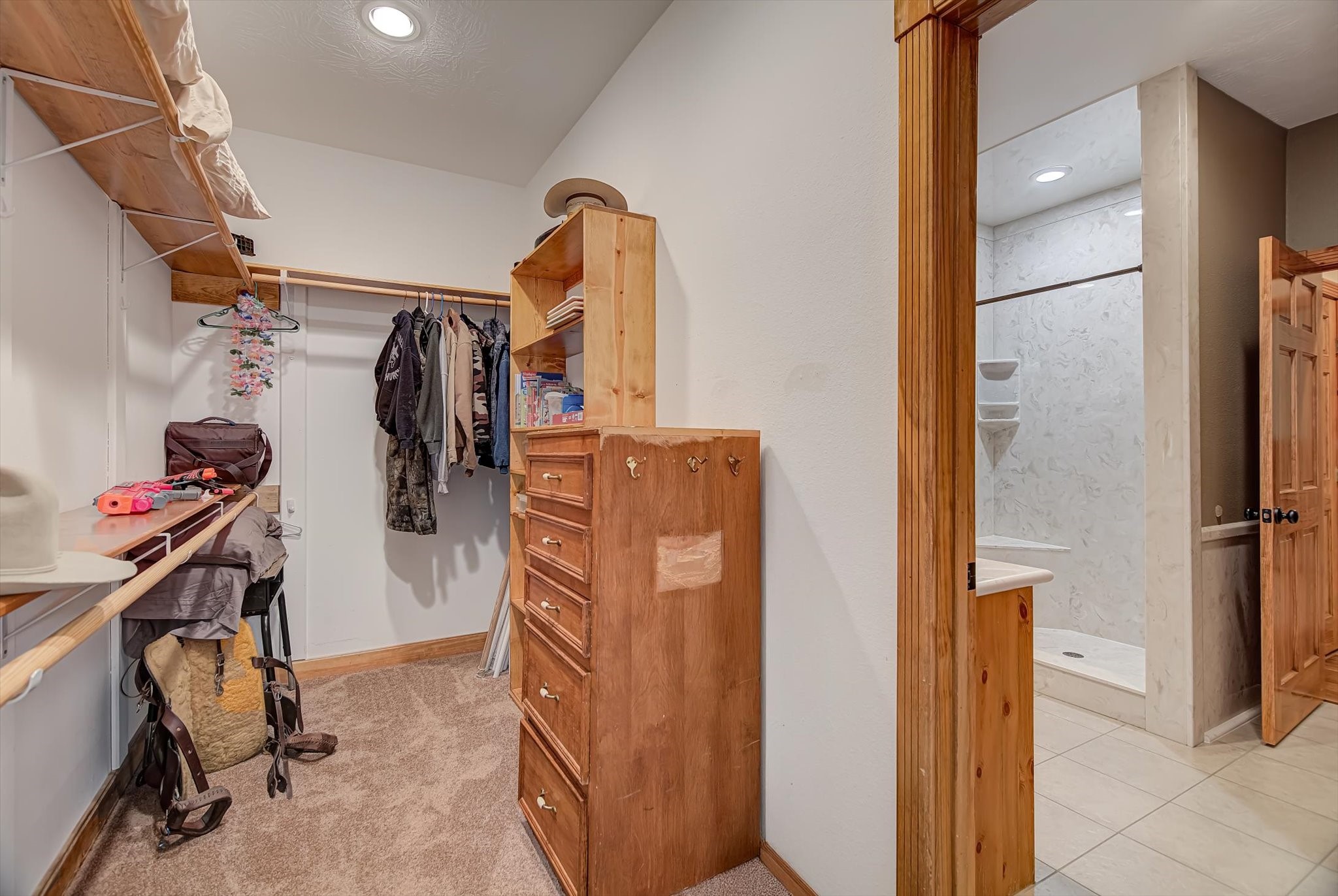 20205 Highway 146 Liberty, TX 77575 - Photo 14 of 50 a view of a storage & utility room with closet fridge and window
