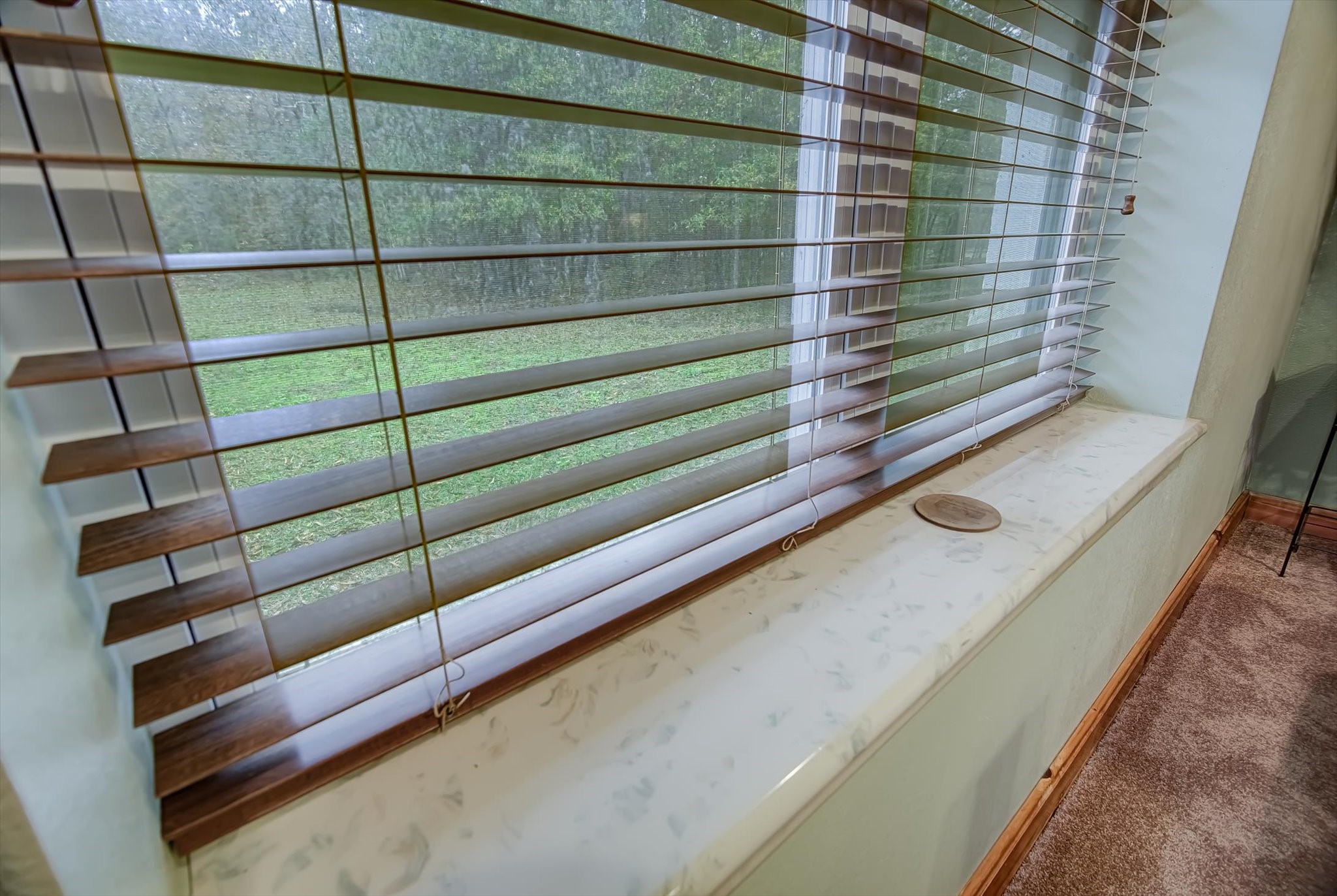 20205 Highway 146 Liberty, TX 77575 - Photo 25 of 50 All window seals are either granite or cultured marble.