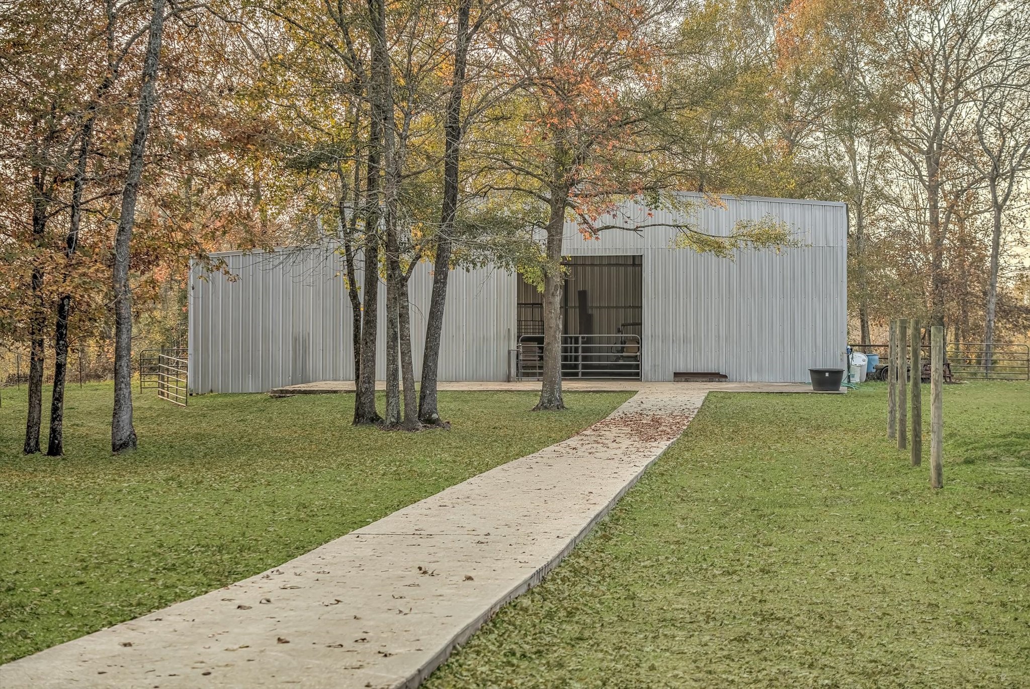 20205 Highway 146 Liberty, TX 77575 - Photo 30 of 50 a view of a backyard with large trees
