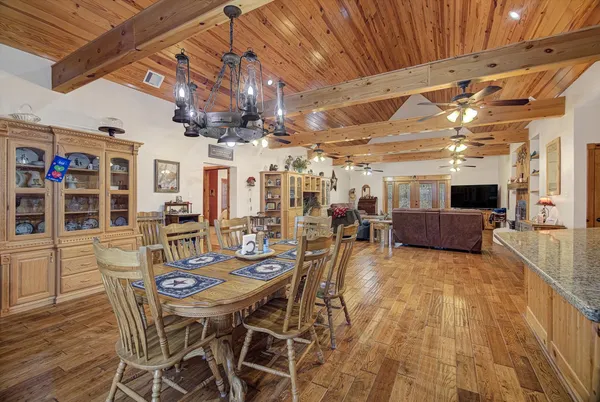a view of a dining room with furniture