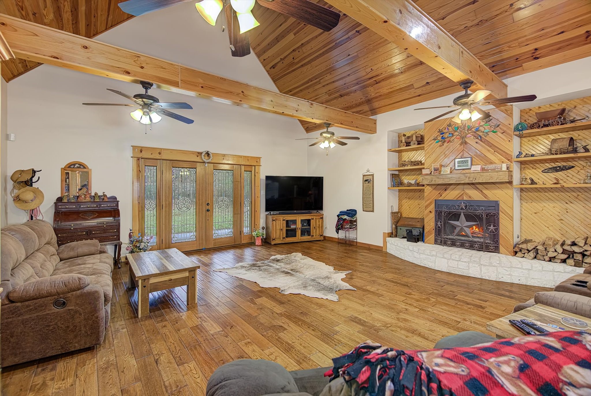 20205 Highway 146 Liberty, TX 77575 - Photo 6 of 50 a living room with furniture and a flat screen tv