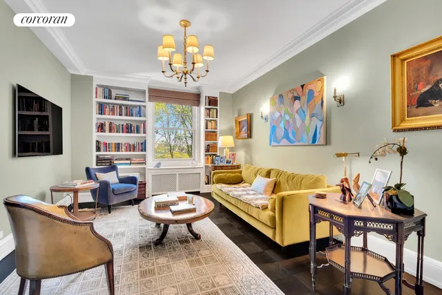 a view of a livingroom with furniture and hardwood floor