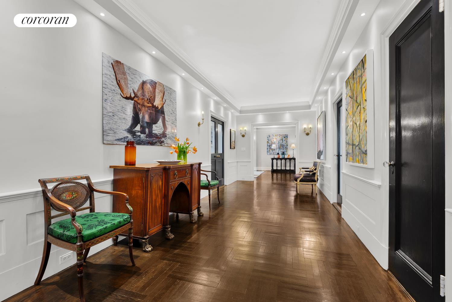 173-175 Riverside Drive, Unit 6D Manhattan, NY 10024 - Photo 11 of 18 a view of a livingroom with furniture and hardwood floor