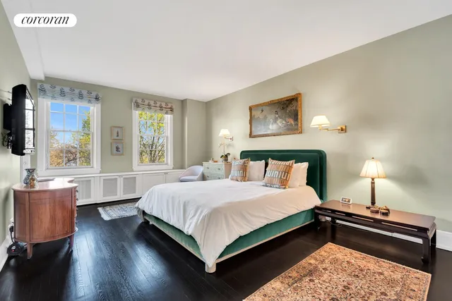 a bedroom with bed and window