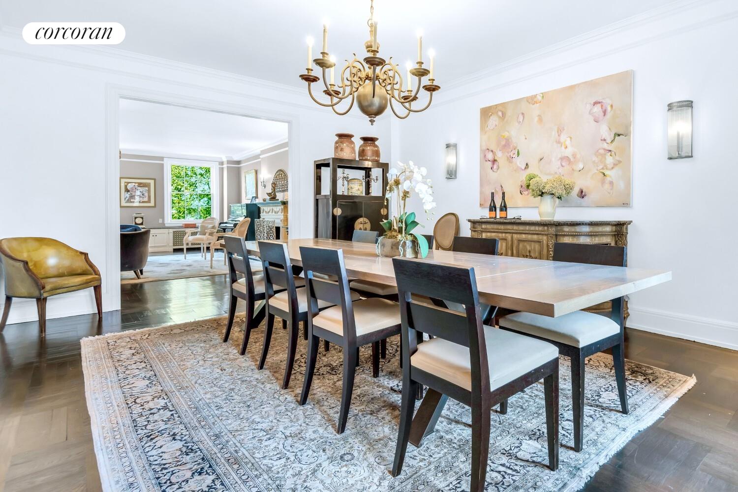 173-175 Riverside Drive, Unit 6D Manhattan, NY 10024 - Photo 4 of 18 a view of a dining room with furniture window and wooden floor