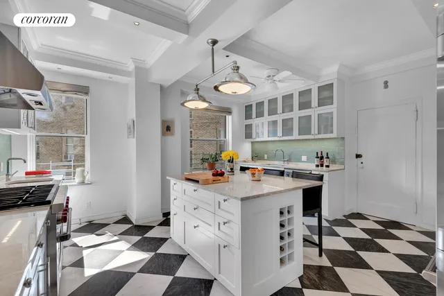 a kitchen with stainless steel appliances granite countertop a sink and cabinets