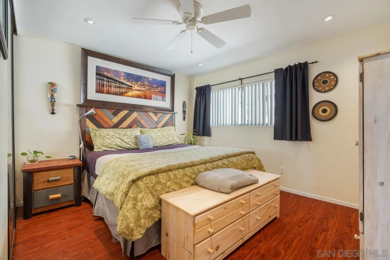 4530 Vandever Avenue, Unit 6 San Diego, CA 92120 - Photo 17 of 25 a bedroom with a bed and a window