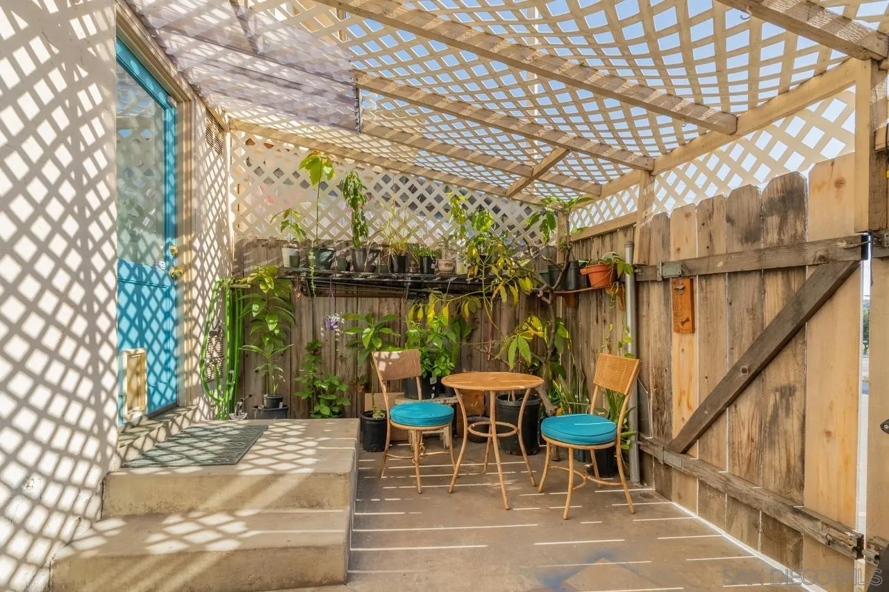 4530 Vandever Avenue, Unit 6 San Diego, CA 92120 - Photo 21 of 25 a outdoor space with chairs