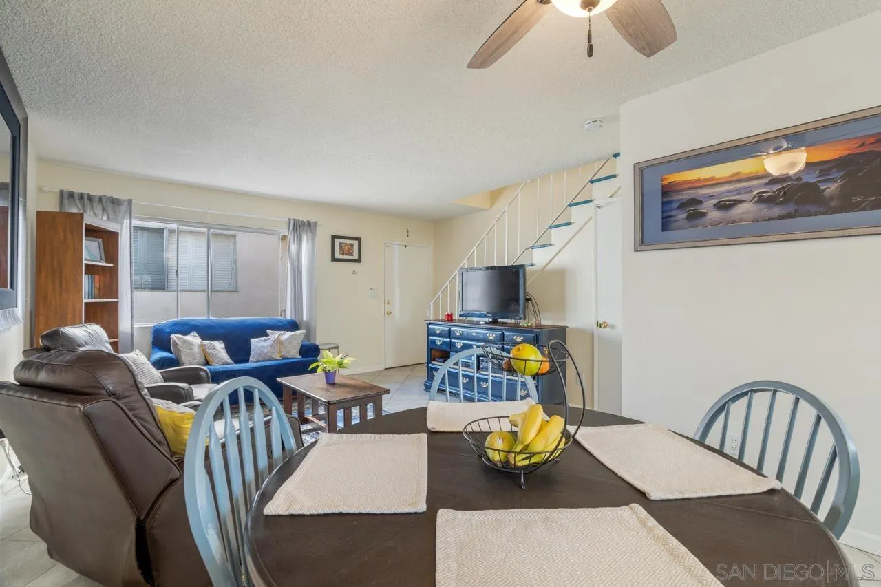 4530 Vandever Avenue, Unit 6 San Diego, CA 92120 - Photo 5 of 25 a living room with furniture and a flat screen tv