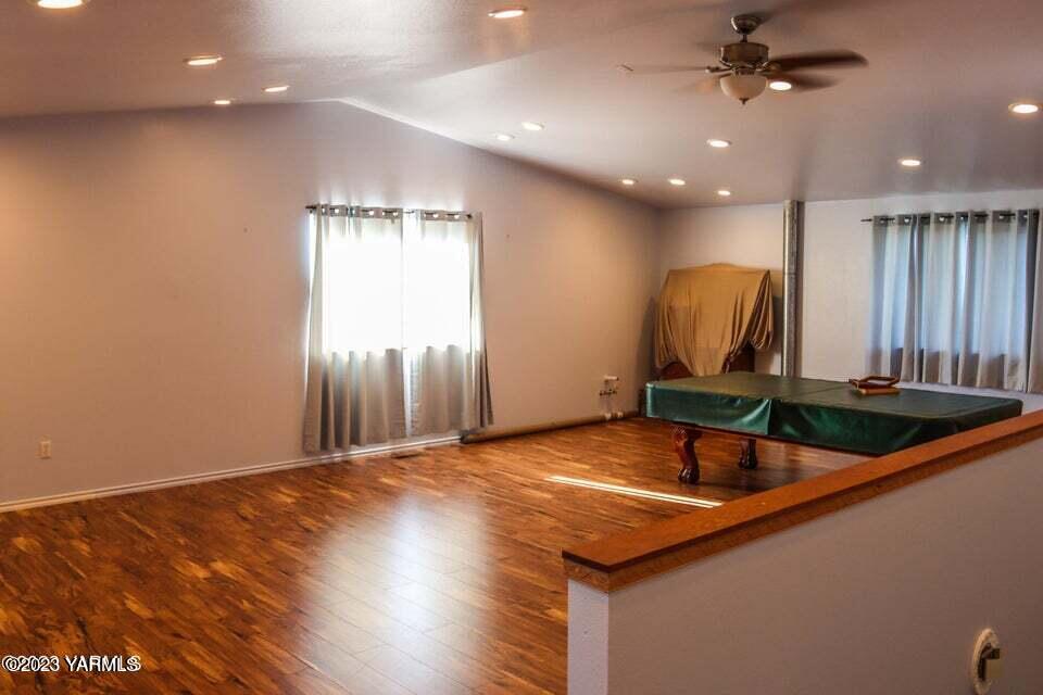 231 Taylor Loop Road Selah, WA 98942 - Photo 17 of 18 a view of a room with gym equipment