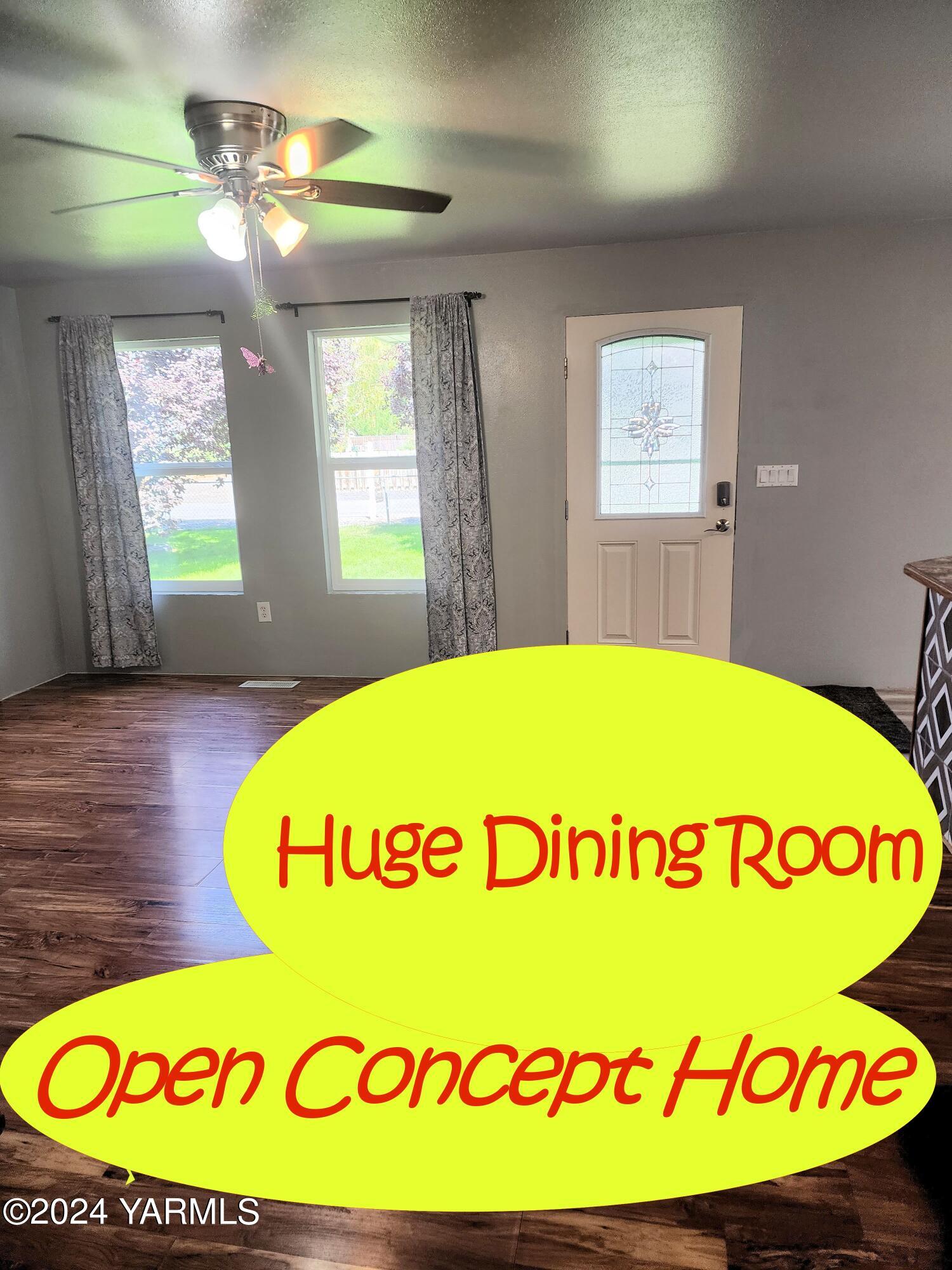 231 Taylor Loop Road Selah, WA 98942 - Photo 7 of 18 a view of a room with a table and chairs