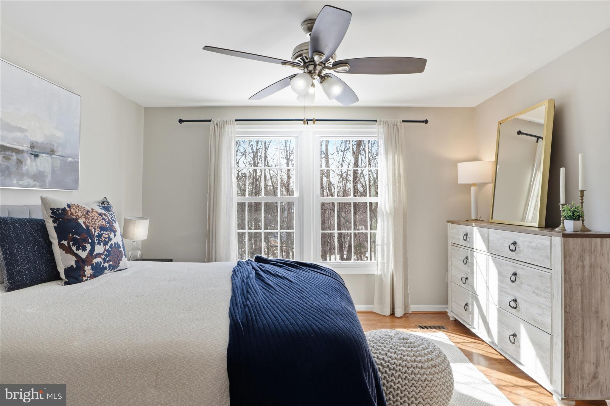1563 Twisted Oak Drive Reston, VA 20194 - Photo 21 of 47 a bed room with a bed and a television