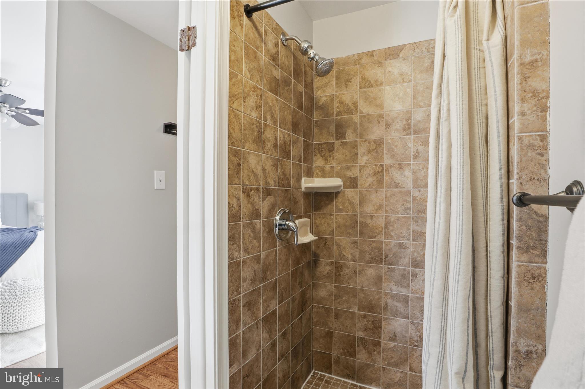 1563 Twisted Oak Drive Reston, VA 20194 - Photo 24 of 47 a bathroom with a shower