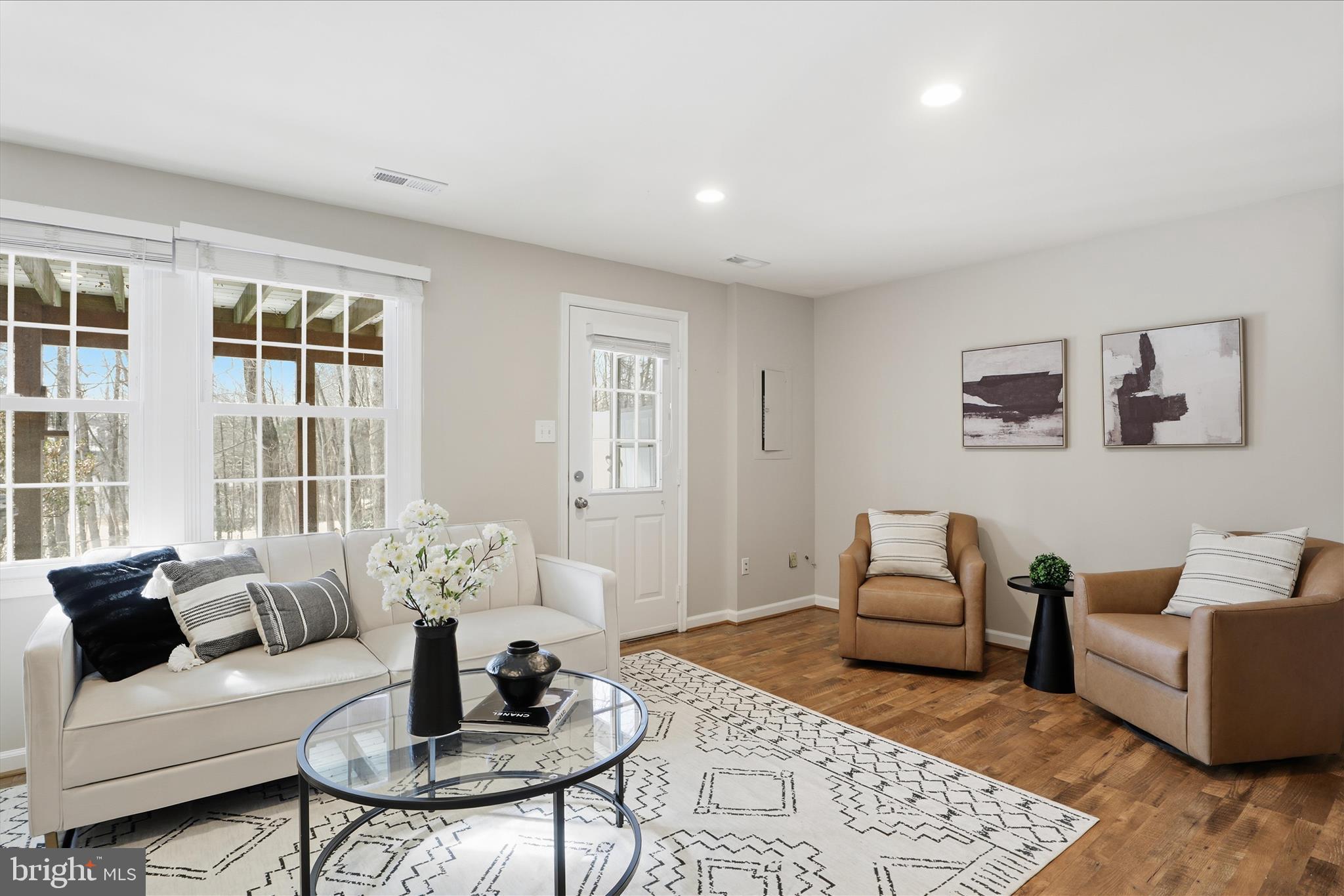 1563 Twisted Oak Drive Reston, VA 20194 - Photo 31 of 47 a living room with furniture and wooden floor
