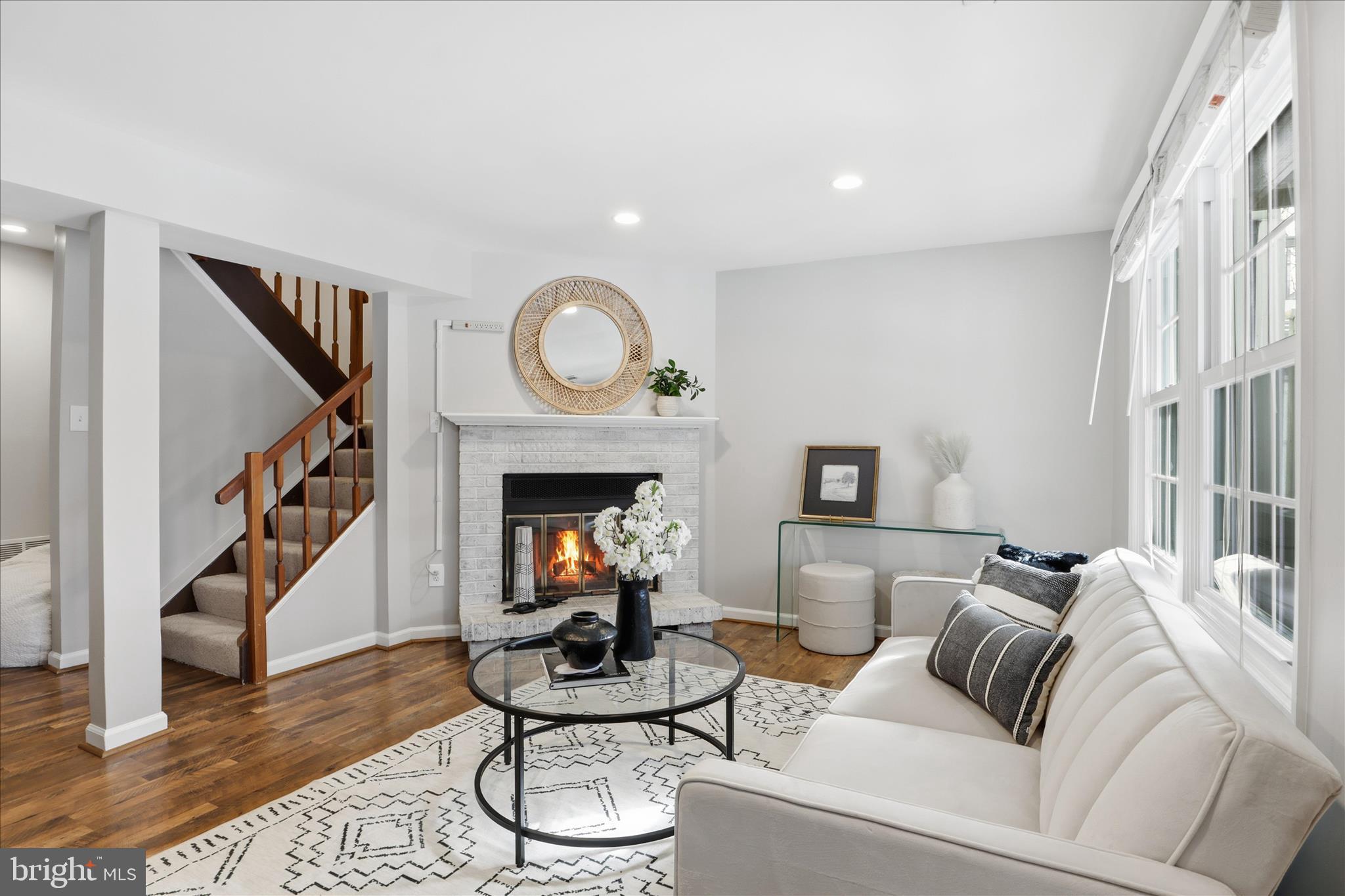 1563 Twisted Oak Drive Reston, VA 20194 - Photo 32 of 47 a living room with furniture and a fireplace