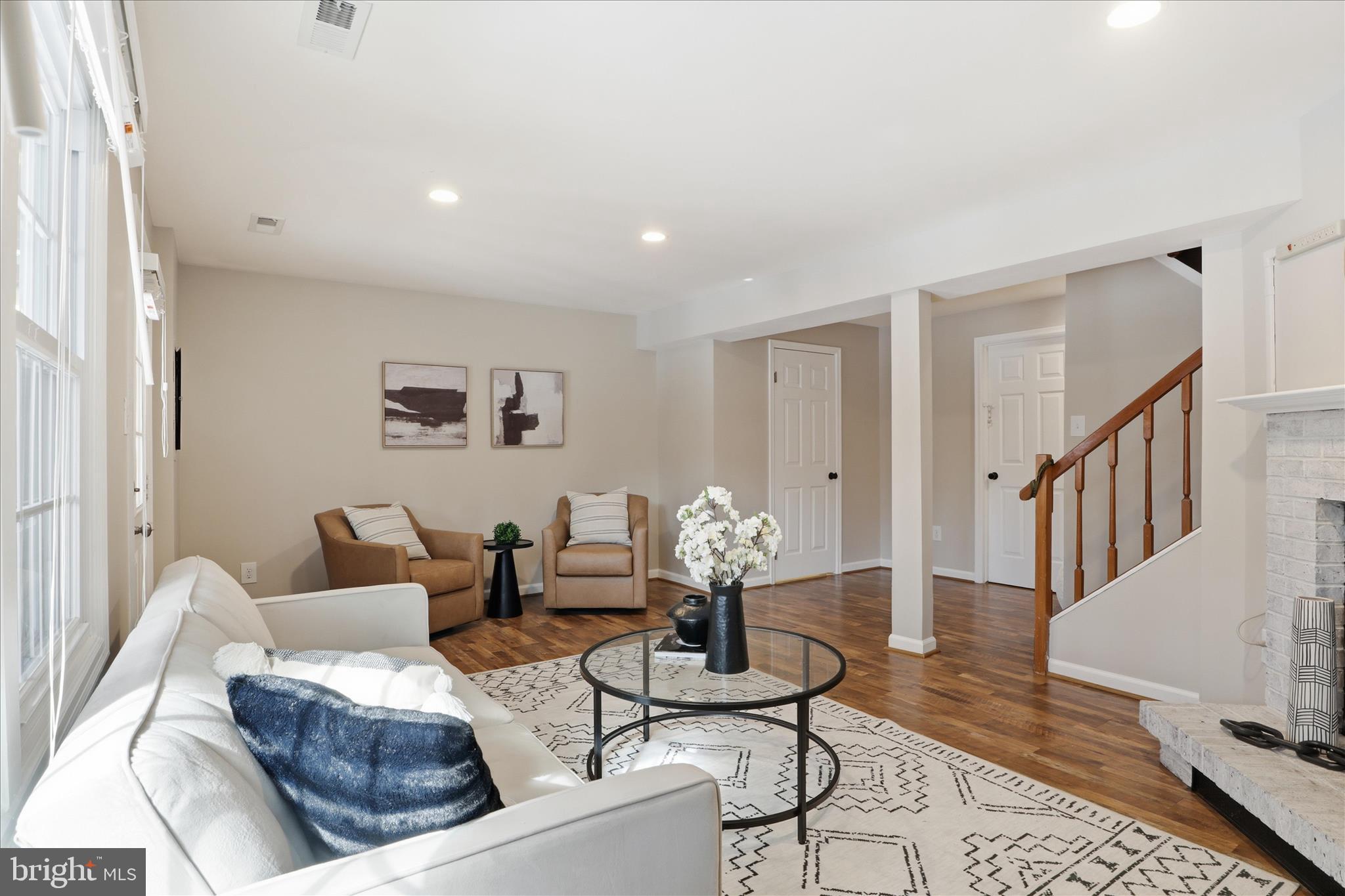 1563 Twisted Oak Drive Reston, VA 20194 - Photo 33 of 47 a living room with furniture and wooden floor