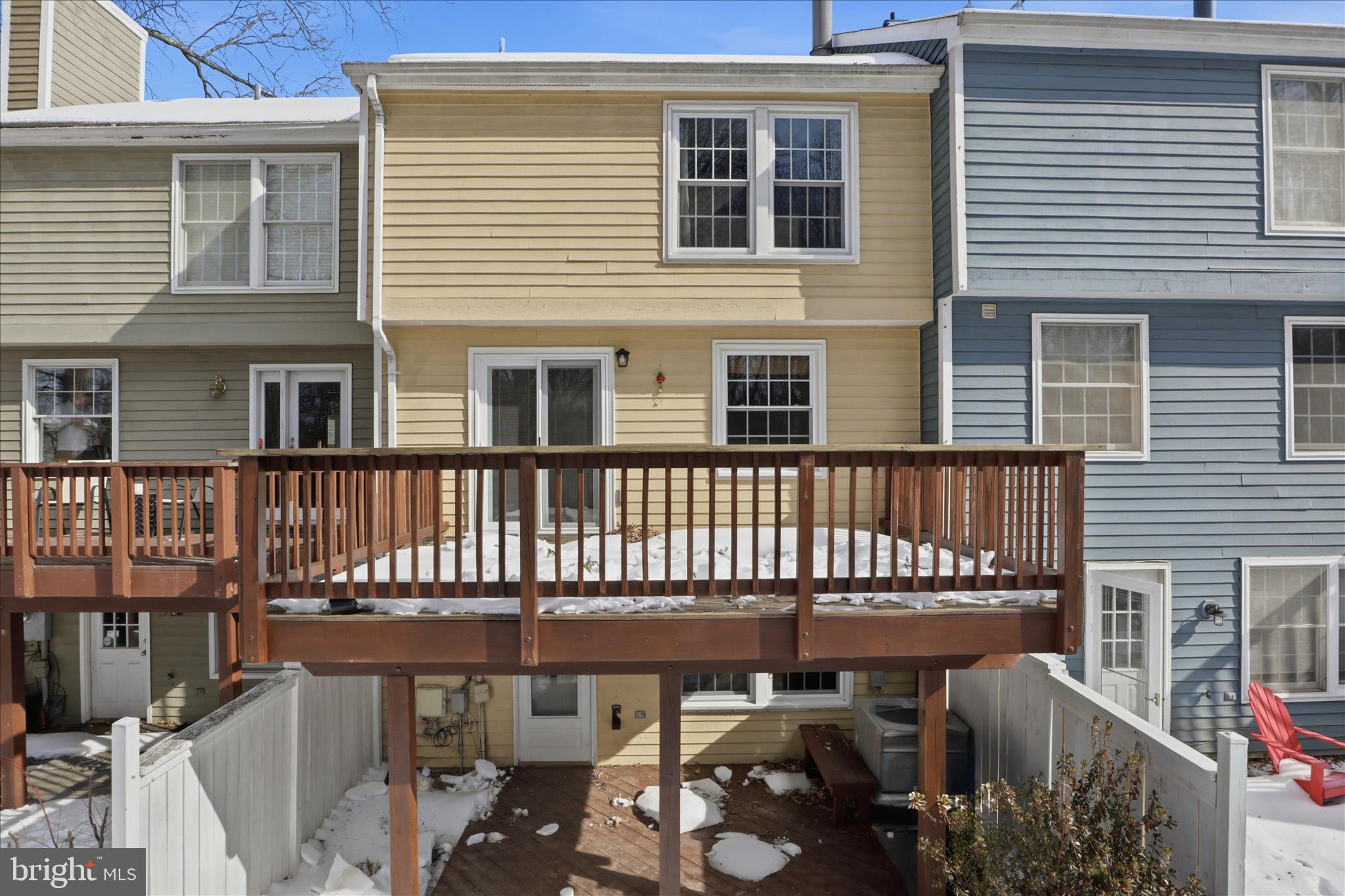 1563 Twisted Oak Drive Reston, VA 20194 - Photo 38 of 47 a view of a brick house with chairs and wooden floor
