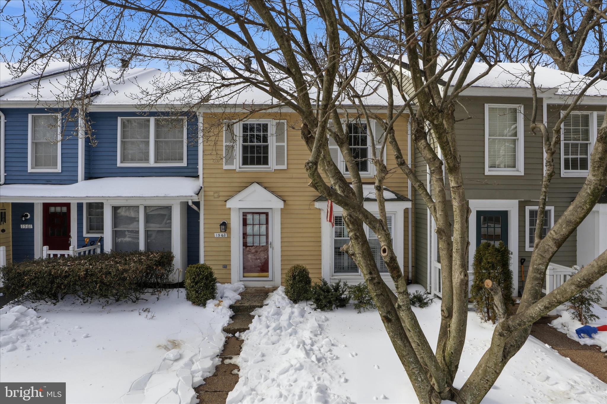 1563 Twisted Oak Drive Reston, VA 20194 - Photo 4 of 47 a front view of a house with a yard