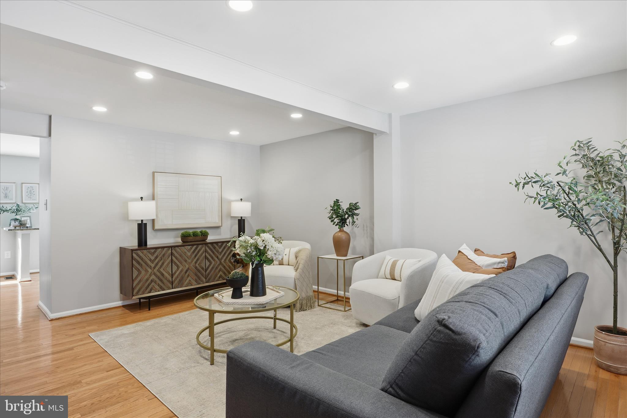 1563 Twisted Oak Drive Reston, VA 20194 - Photo 7 of 47 a living room with furniture and wooden floor
