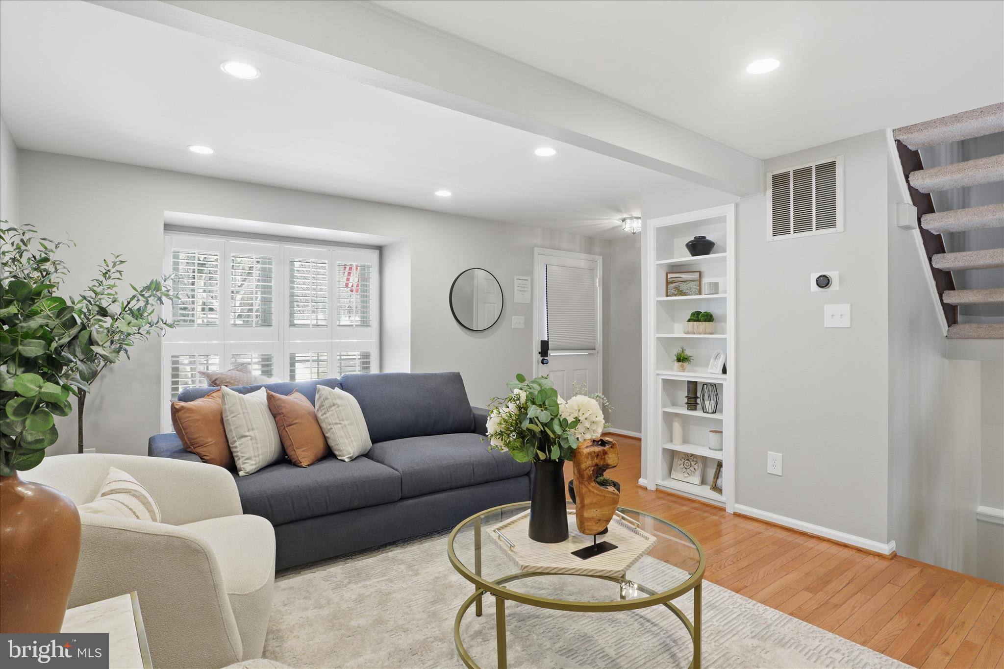 1563 Twisted Oak Drive Reston, VA 20194 - Photo 8 of 47 a living room with furniture and wooden floor
