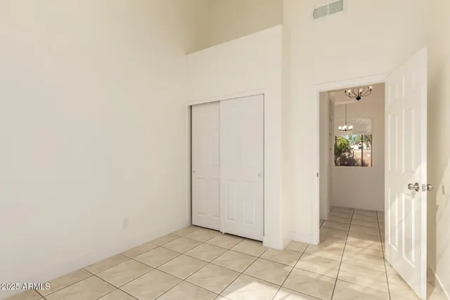 an empty room with mirror