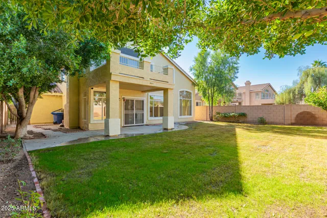 a view of a house with a swimming pool