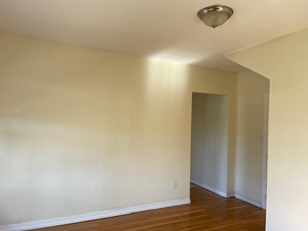 272-2 Nevada Street, Unit 2 Newton, MA 02460 - Photo 19 of 28 a view of a room with wooden floor
