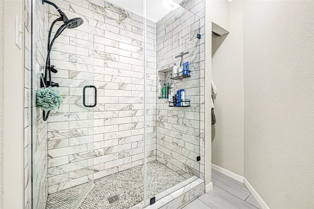 a living room with furniture a piano and a window