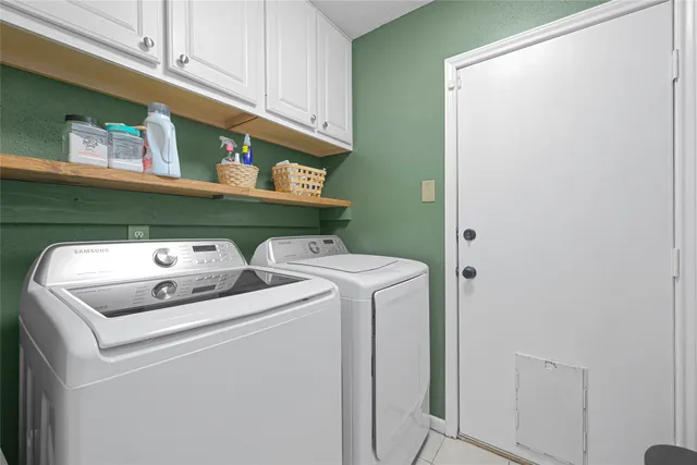 a bathroom with a toilet and a bathtub