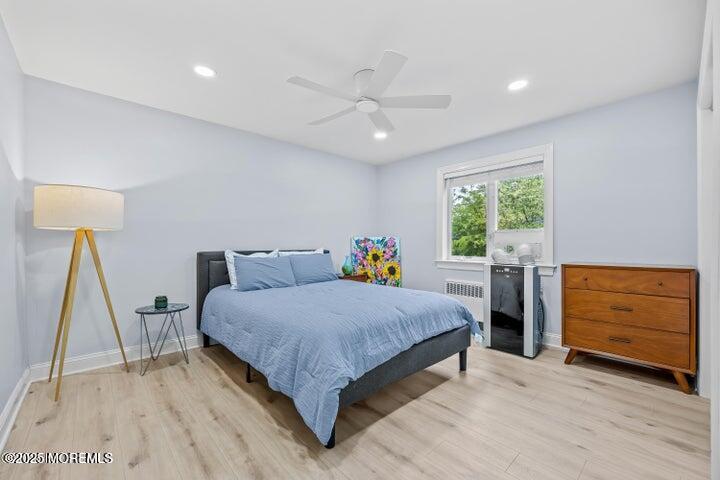 283 Spring Street, Unit 3A Red Bank, NJ 07701 - Photo 11 of 20 a bedroom with a bed and a window