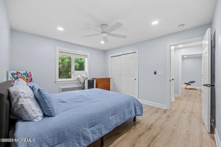 283 Spring Street, Unit 3A Red Bank, NJ 07701 - Photo 12 of 20 a bedroom with a bed and a window