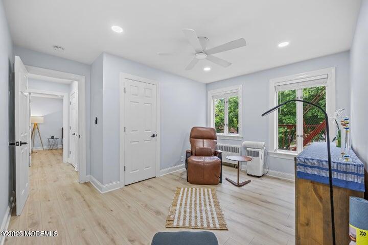 283 Spring Street, Unit 3A Red Bank, NJ 07701 - Photo 14 of 20 a living room with furniture or window and a wooden floor