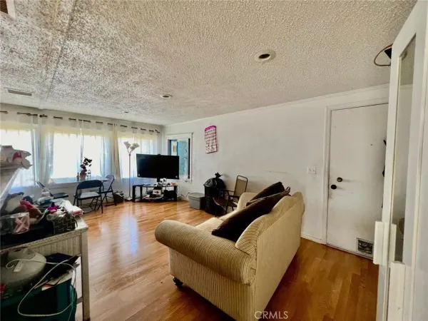 a bedroom with bed and a window