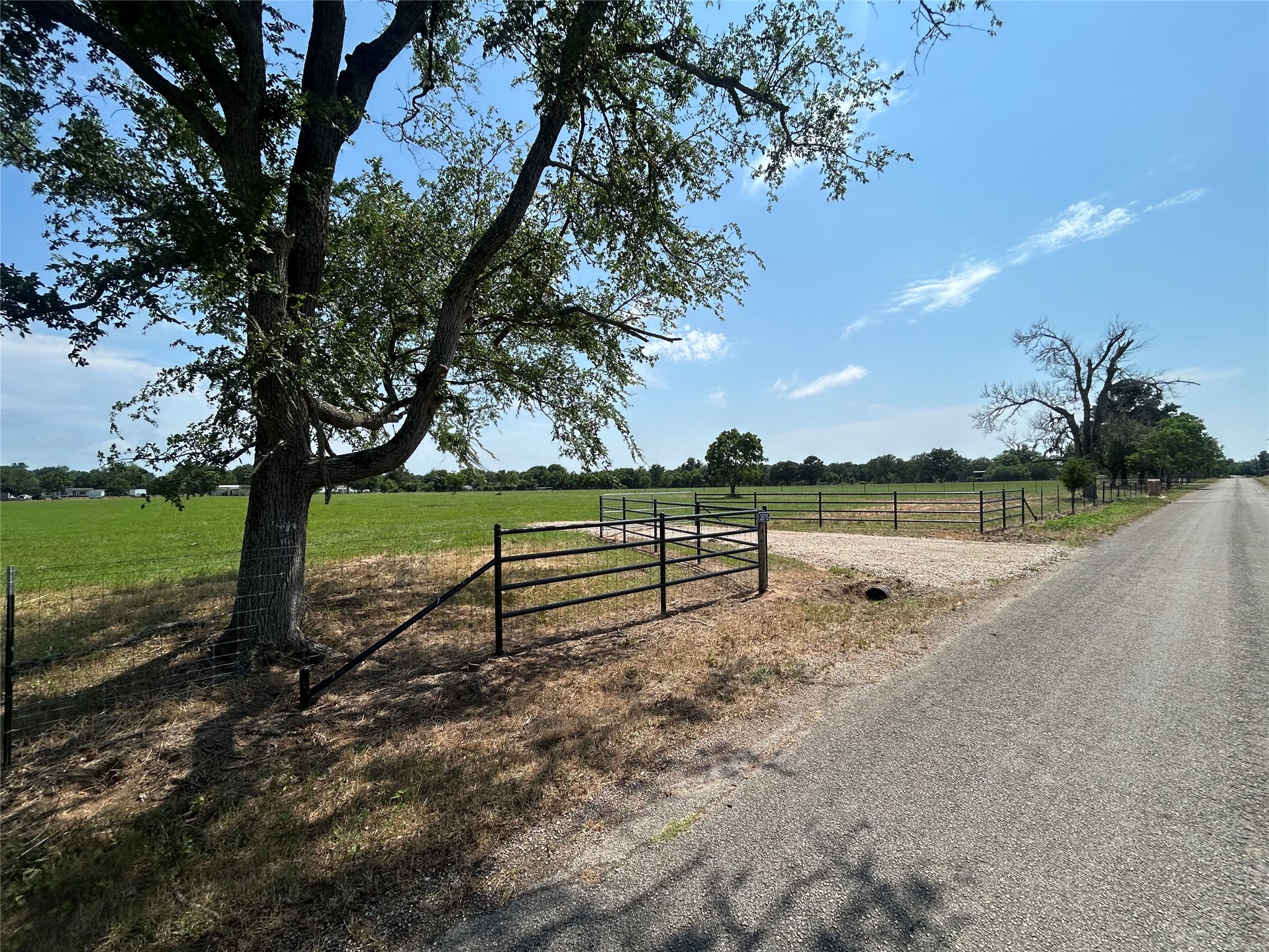 38715 Wiggins Road Hempstead, TX 77445 - Photo 4 of 8 a view of a bench in a yard