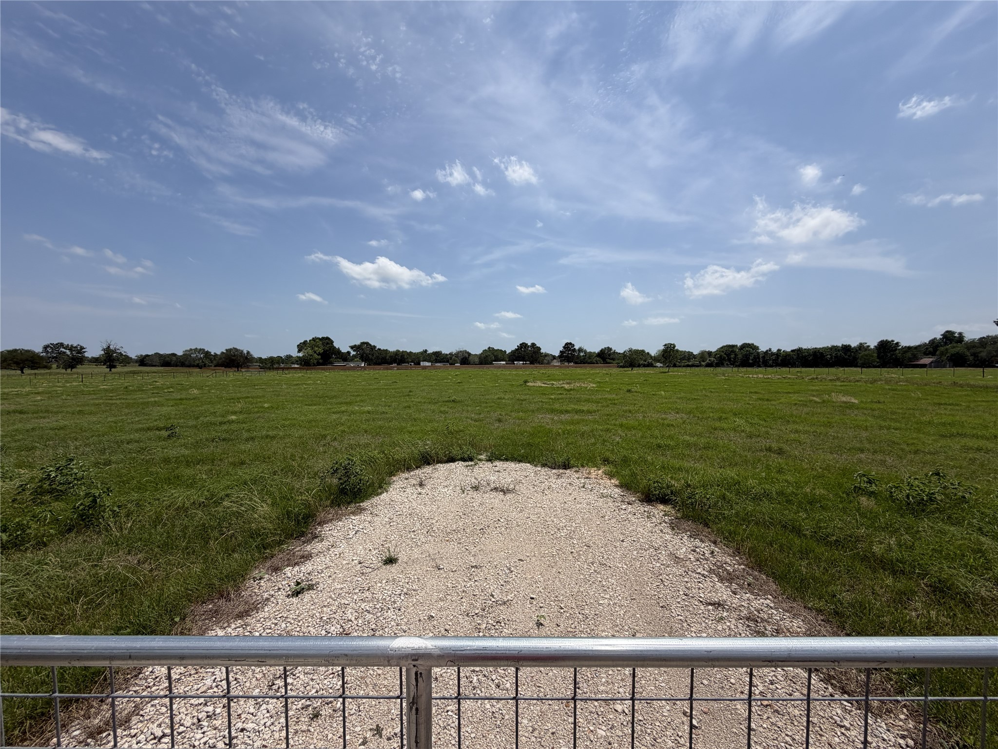 38715 Wiggins Road Hempstead, TX 77445 - Photo 7 of 8 a view of a lake from a yard