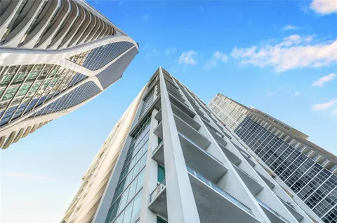 a view of a city with tall buildings