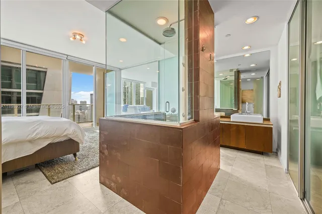 a bathroom with a shower and a mirror