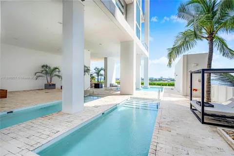 a view of a pathway with a yard