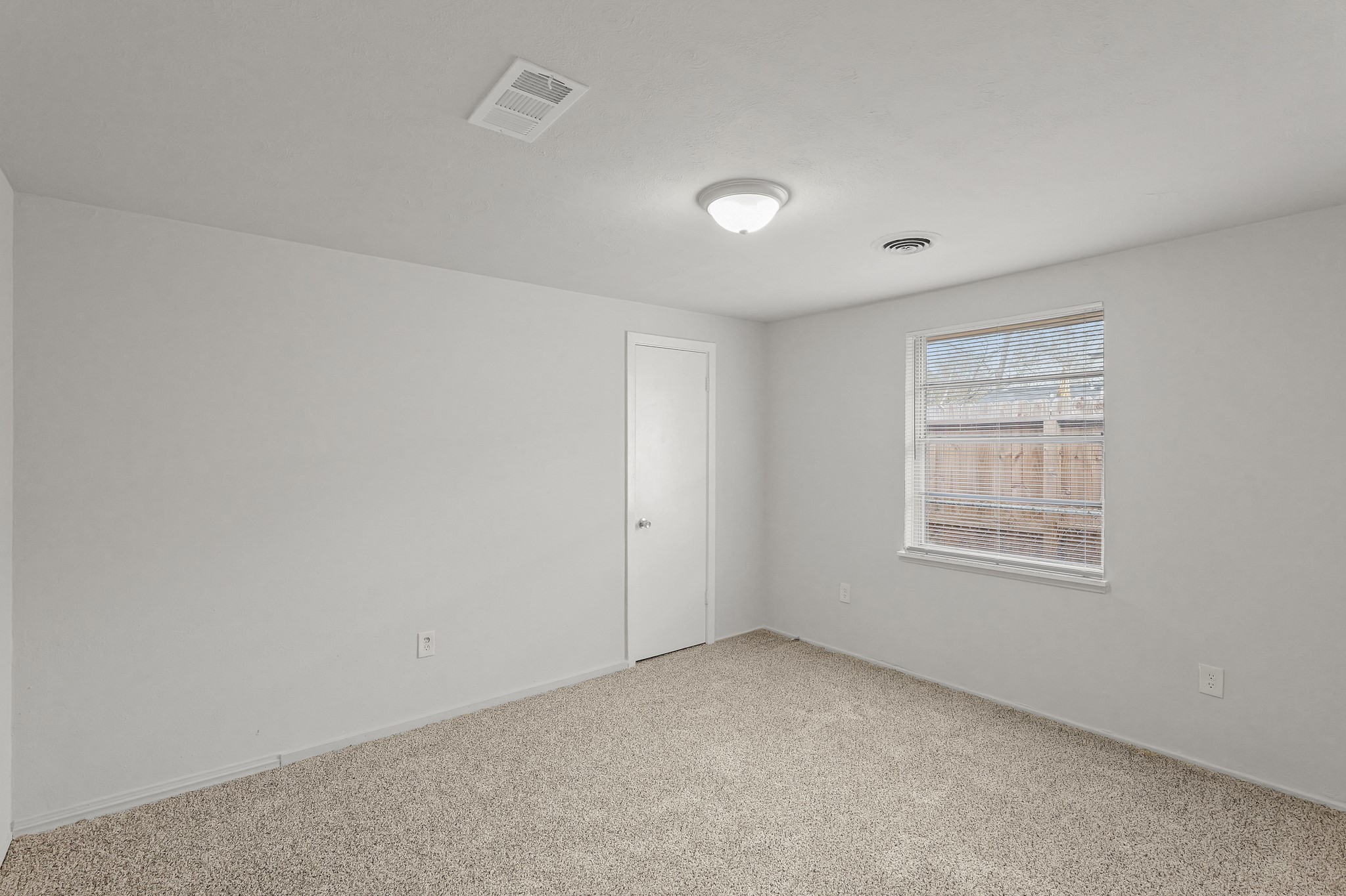 414 Grantham Road Baytown, TX 77521 - Photo 11 of 19 an empty room with a window